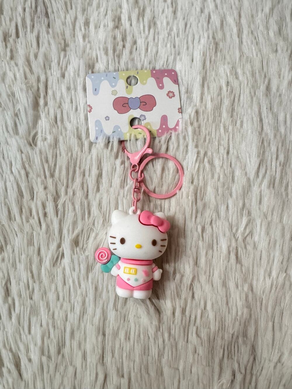 Hello Kitty keychain with pink bow and lollipop